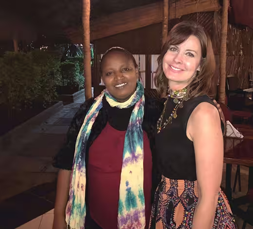 Two women smiling